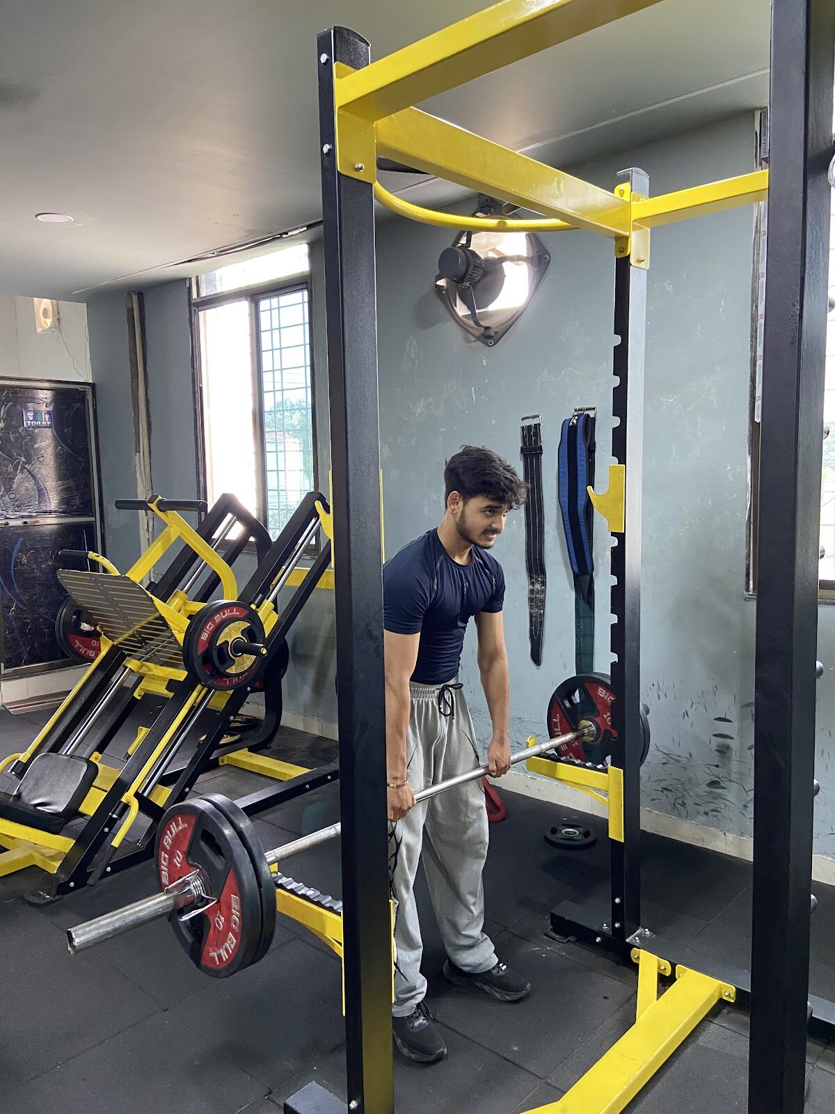 Member training on strength machines at Soul Fitness